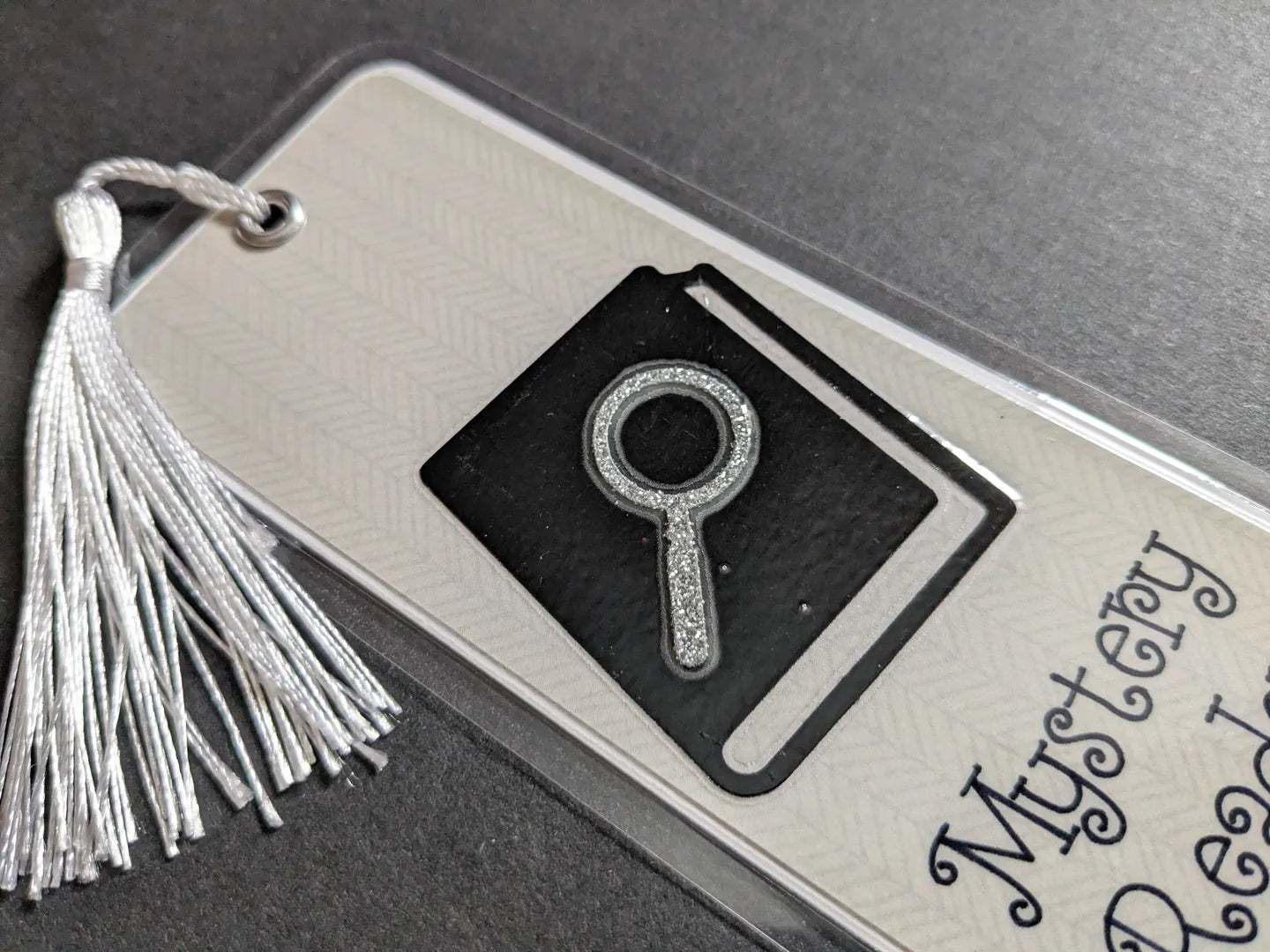 Mystery Reader Magnifying Glass Laminated Bookmark